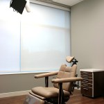 A patient room with a chair